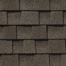 A close up of a roof with shingles on it.