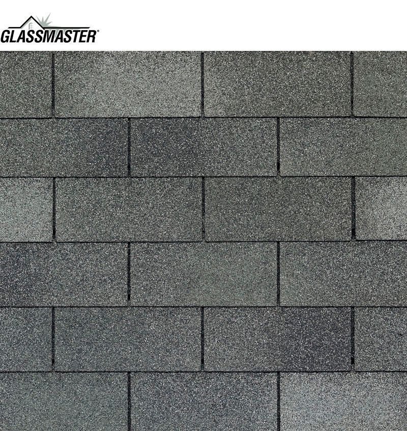 A close up of a row of gray shingles on a roof.