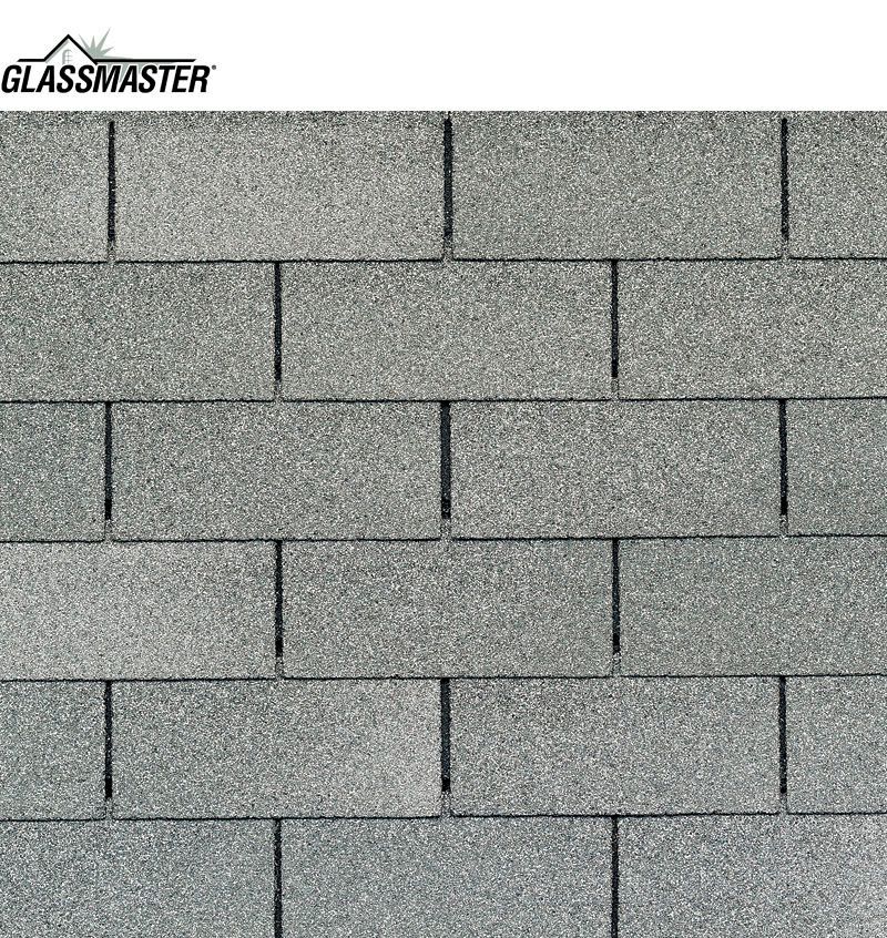 A close up of a row of gray shingles on a roof.