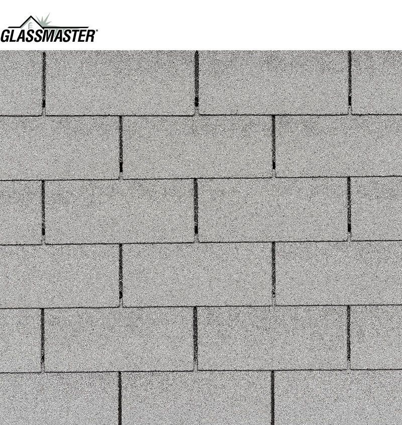 A close up of a row of gray shingles on a roof.