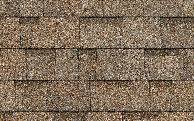 A close up of a roof with shingles on it.