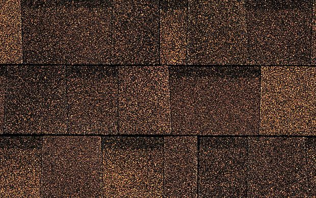 A close up of a brown roof shingle.