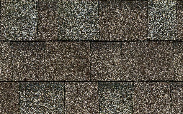 A close up of a roof with shingles on it.