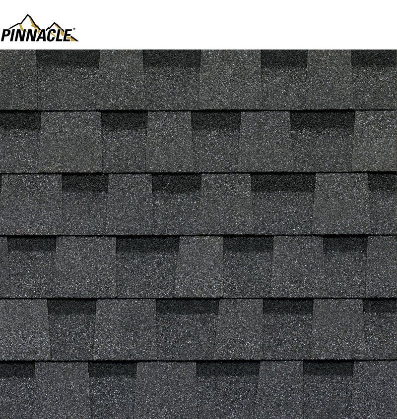 A close up of a row of black shingles on a roof.