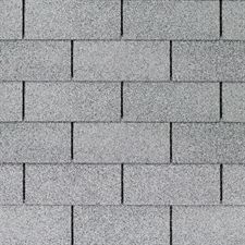 A close up of a gray brick wall.
