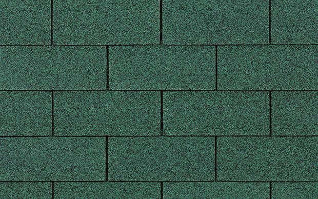 A close up of a green roof tile.