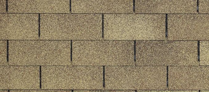 A close up of a roof with shingles on it.