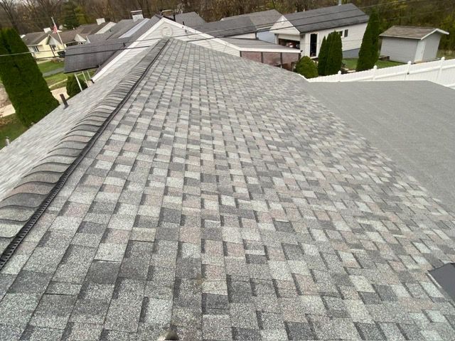 A roof with a lot of shingles on it