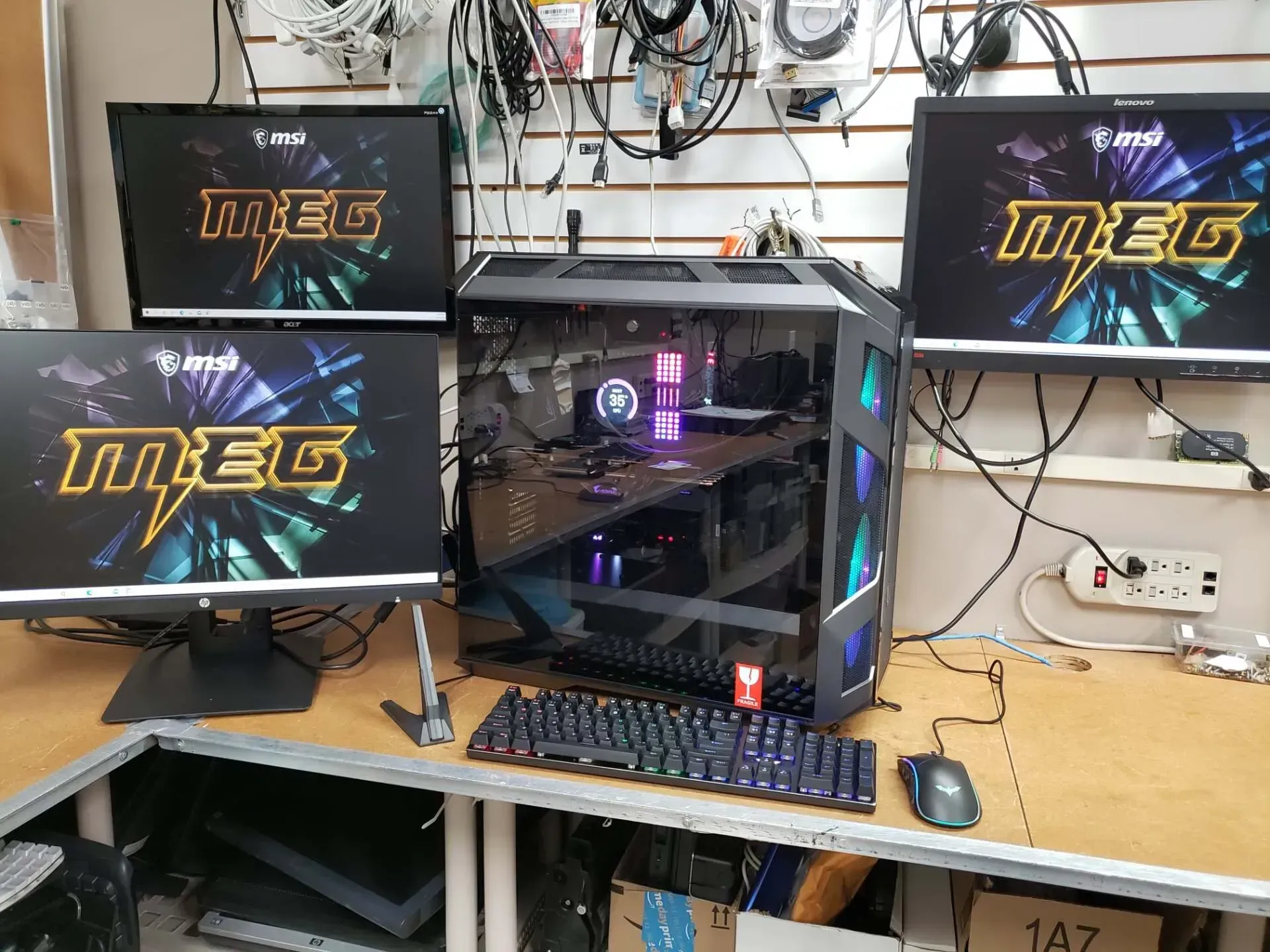 Gaming PC setup with three monitors displaying 