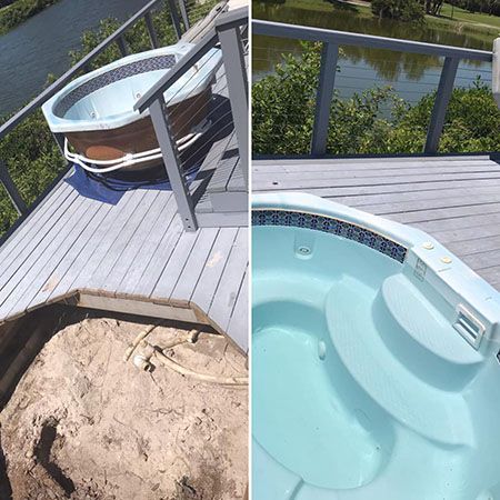 A blue hot tub is sitting in a room next to a window.