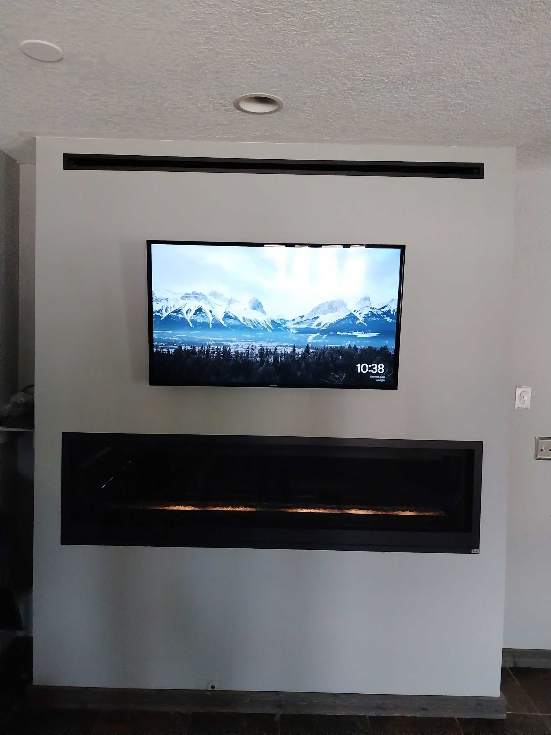 TV above an electric fireplace