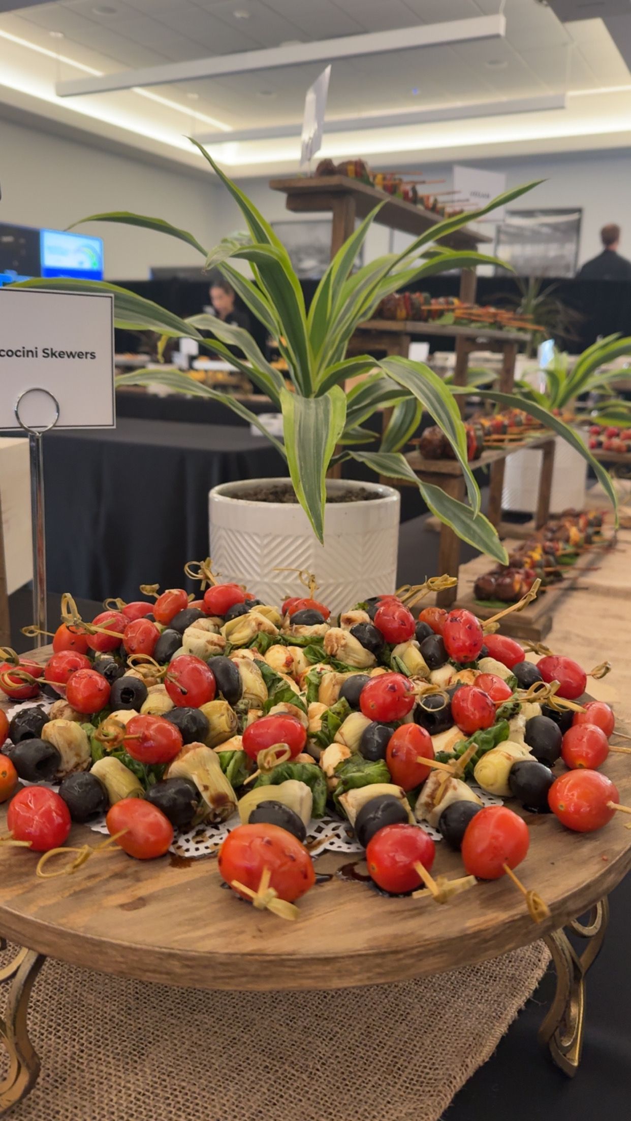 A wooden table topped with a variety of fruits and vegetables.
