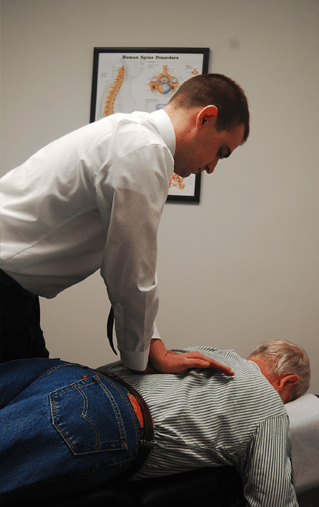 Chiropractic-doctor-with-old-man