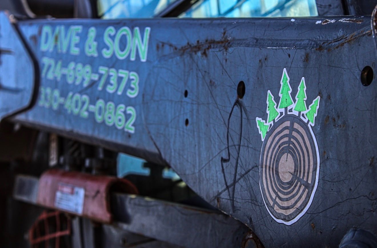 Truck side with the business name and logo