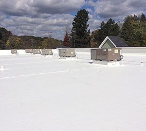 Concrete roof coatings