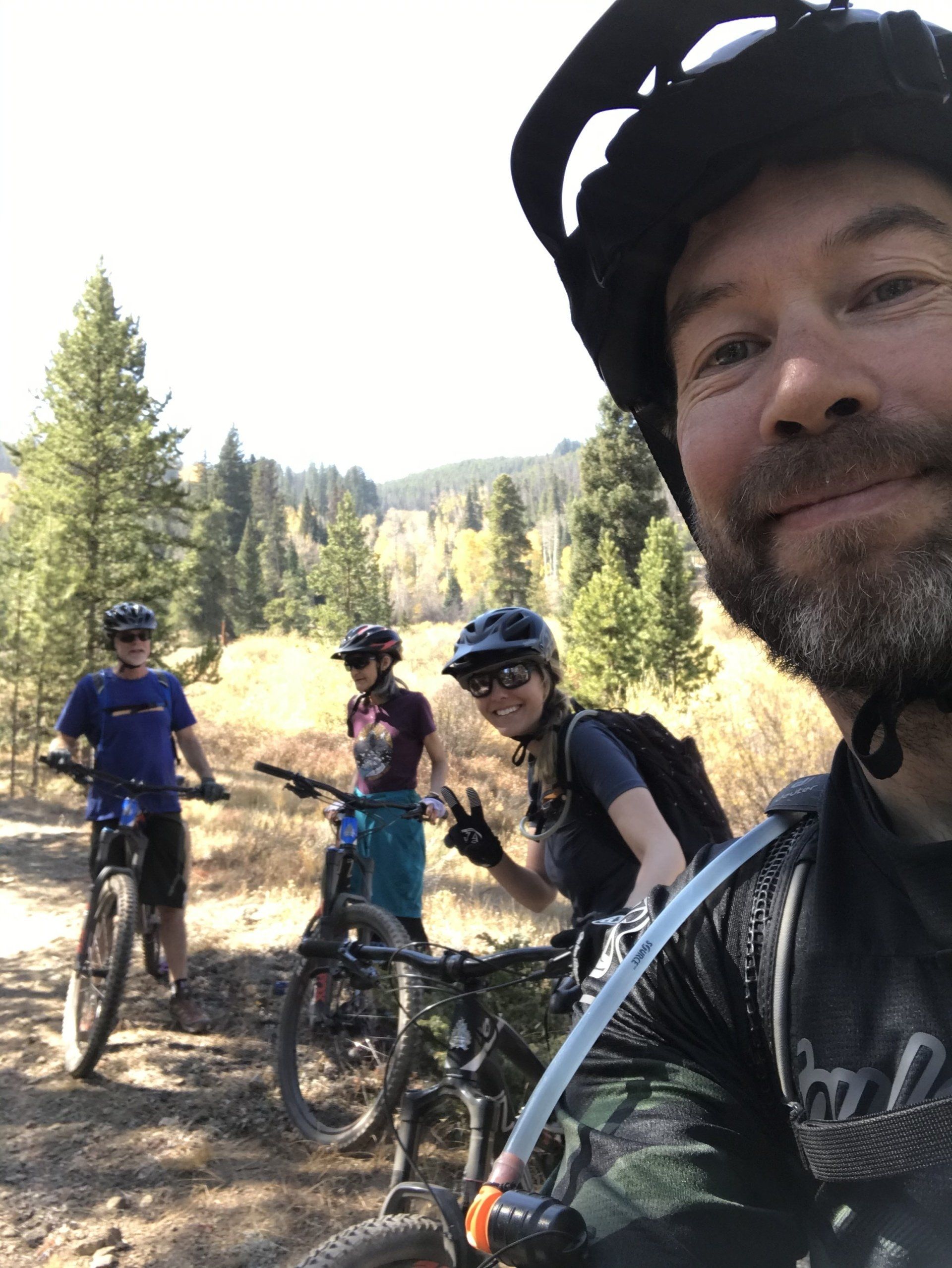 Friends having fun mountain biking in Breckenridge, CO.