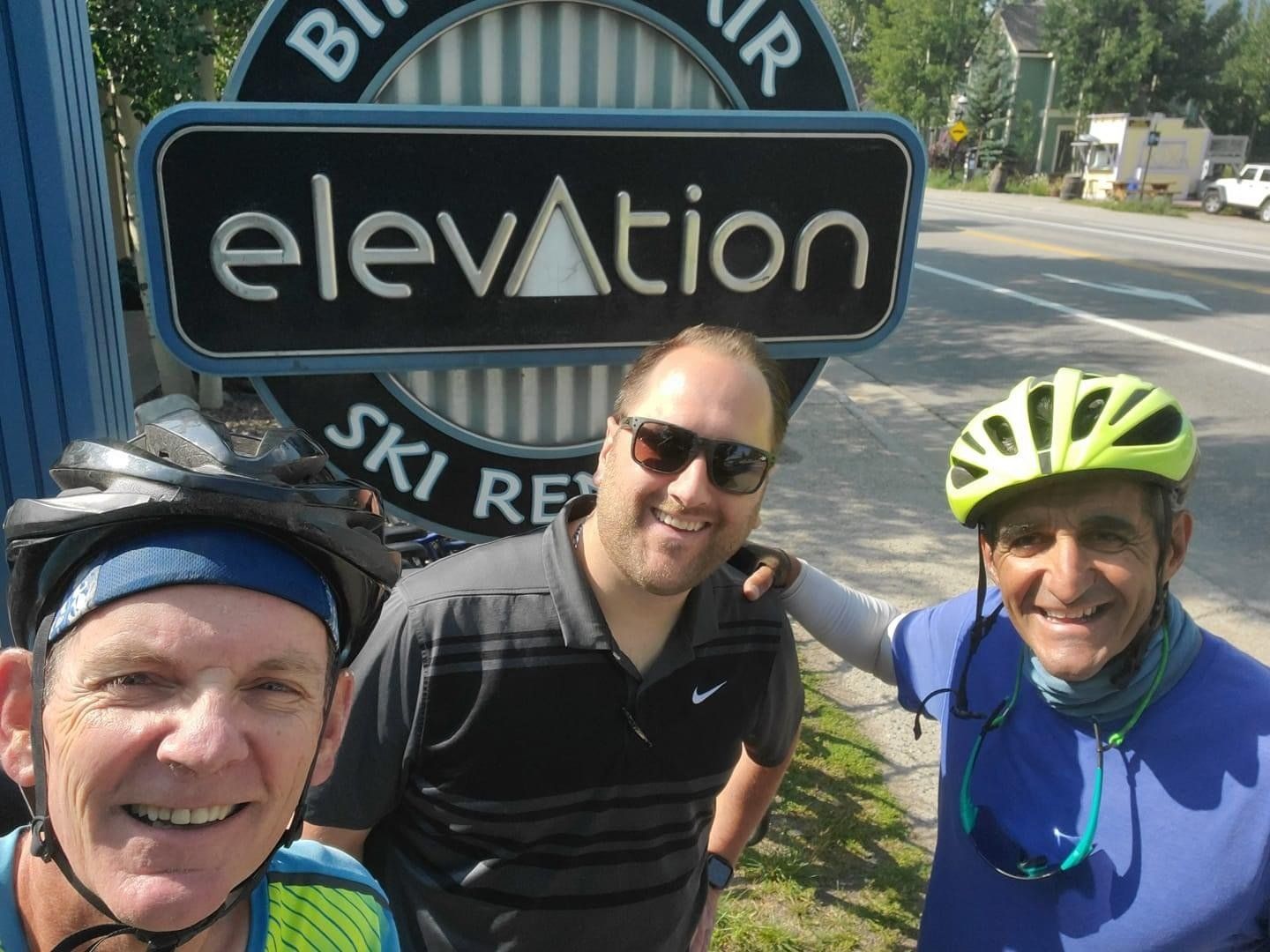 Happy bikers in front of Elevation Ski & Bike, Breckenridge, CO.