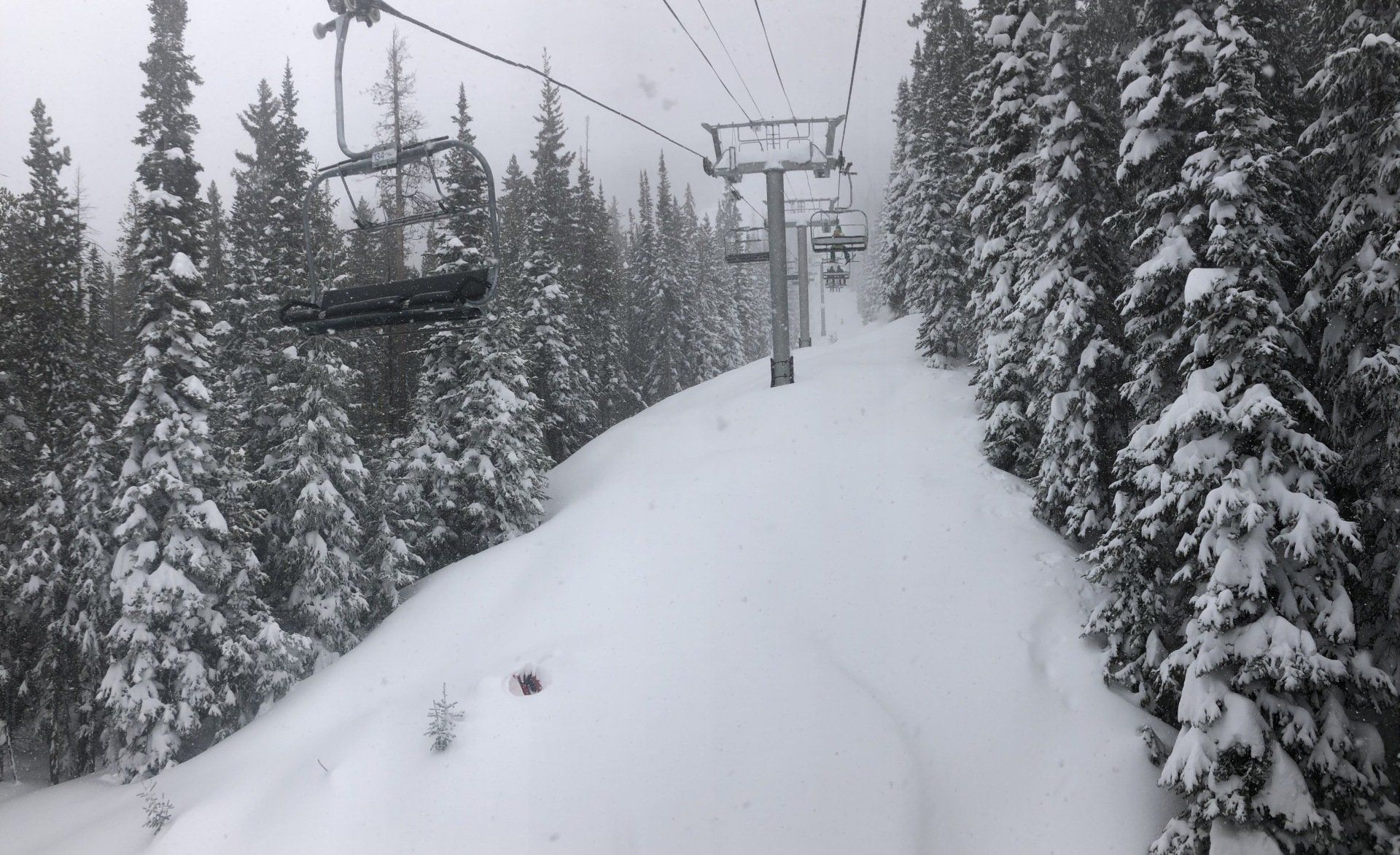 Deep snow under chairlift in Breckenridge, CO.