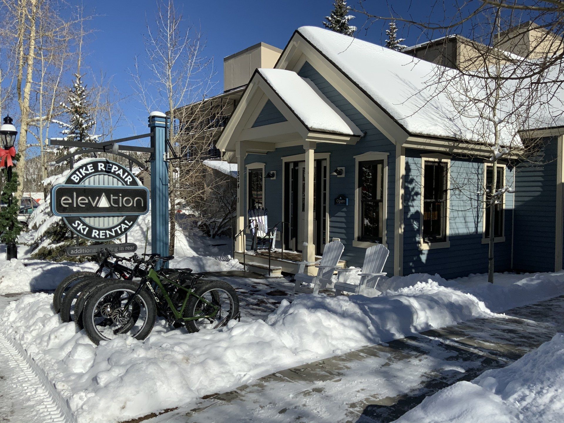 Fat bikes displayed in the snow outside Elevation Ski & Bike, Breckenridge, CO.