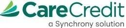 CareCredit logo with green text and a teal leaf design.