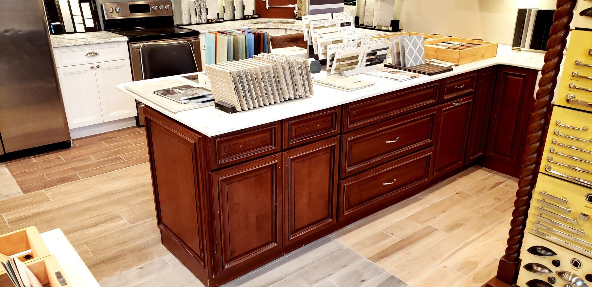 A kitchen with a large island in the middle of it.