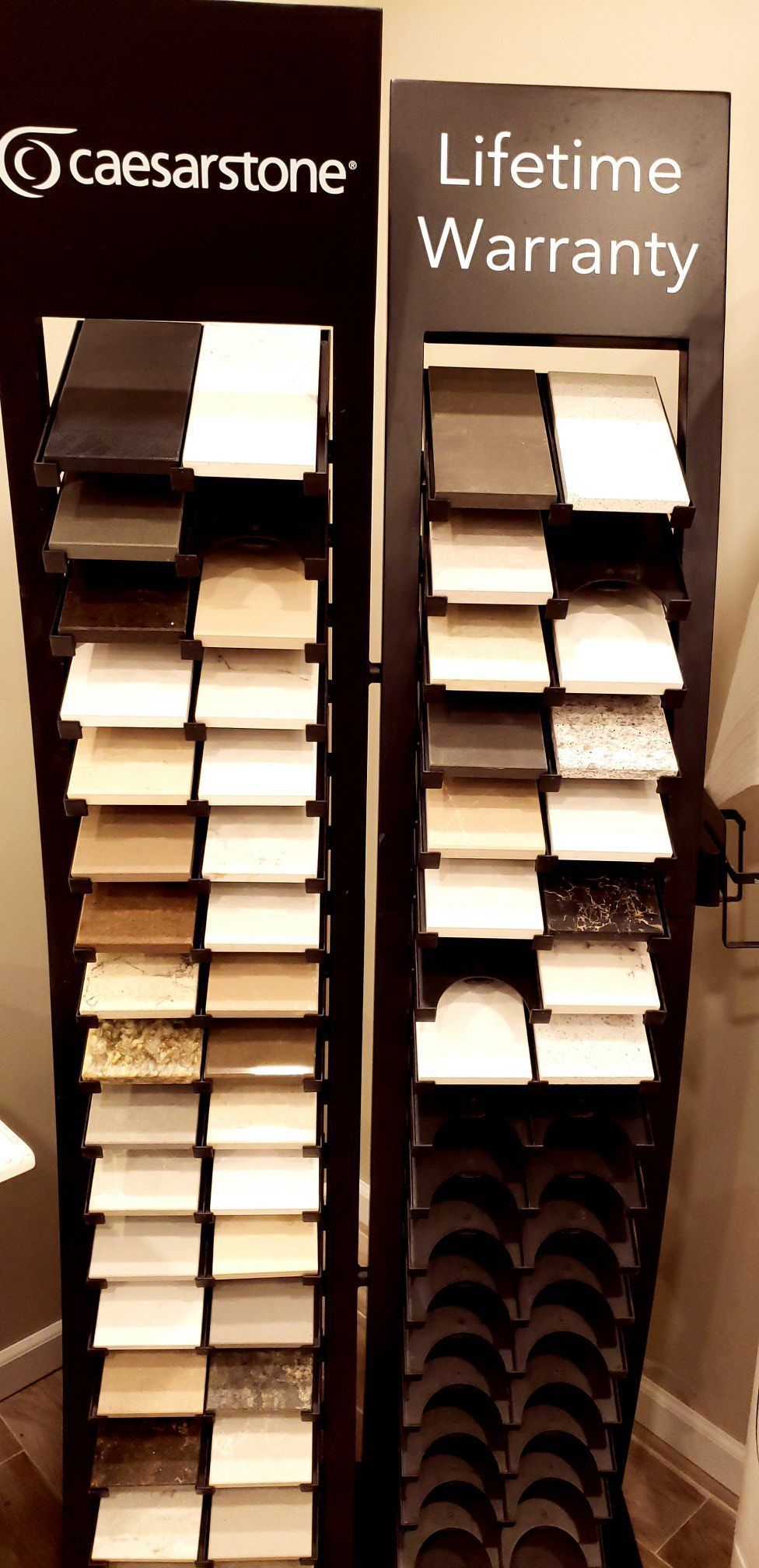 A display of caesarstone counter tops with a lifetime warranty.