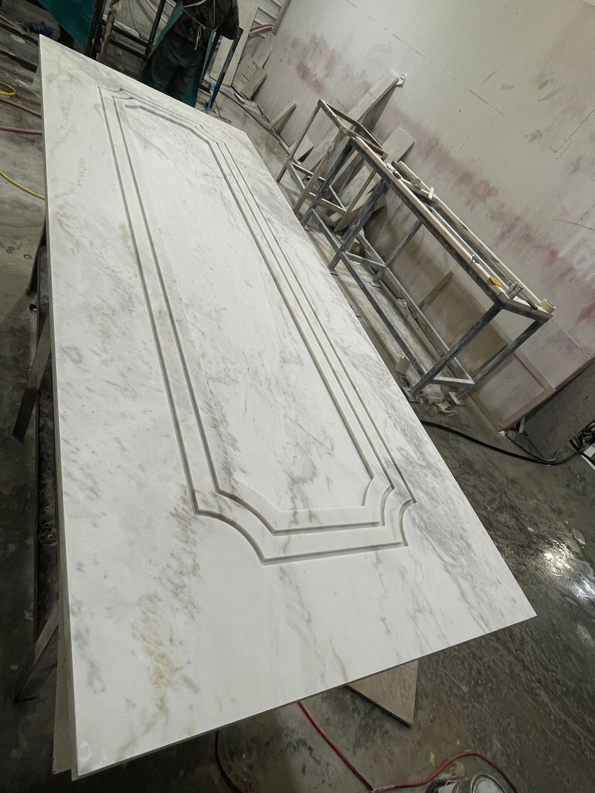 A large piece of wood is sitting on top of a table.