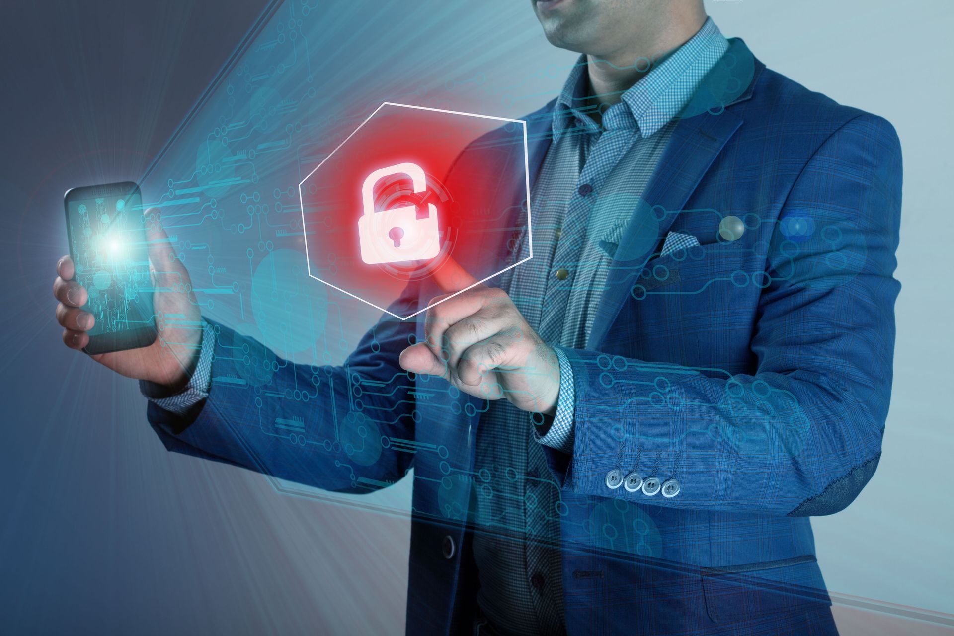Person in a blue suit holding a smartphone beside a glowing padlock icon on a digital interface.