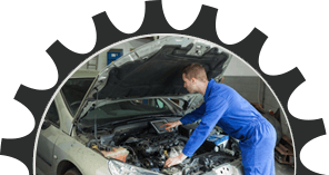 Mechanic Examining Car Engine