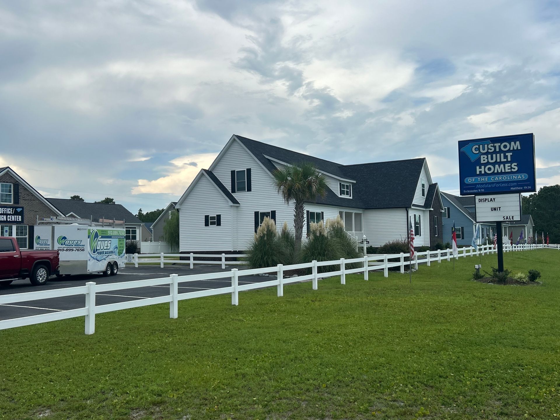 White house with a sign 