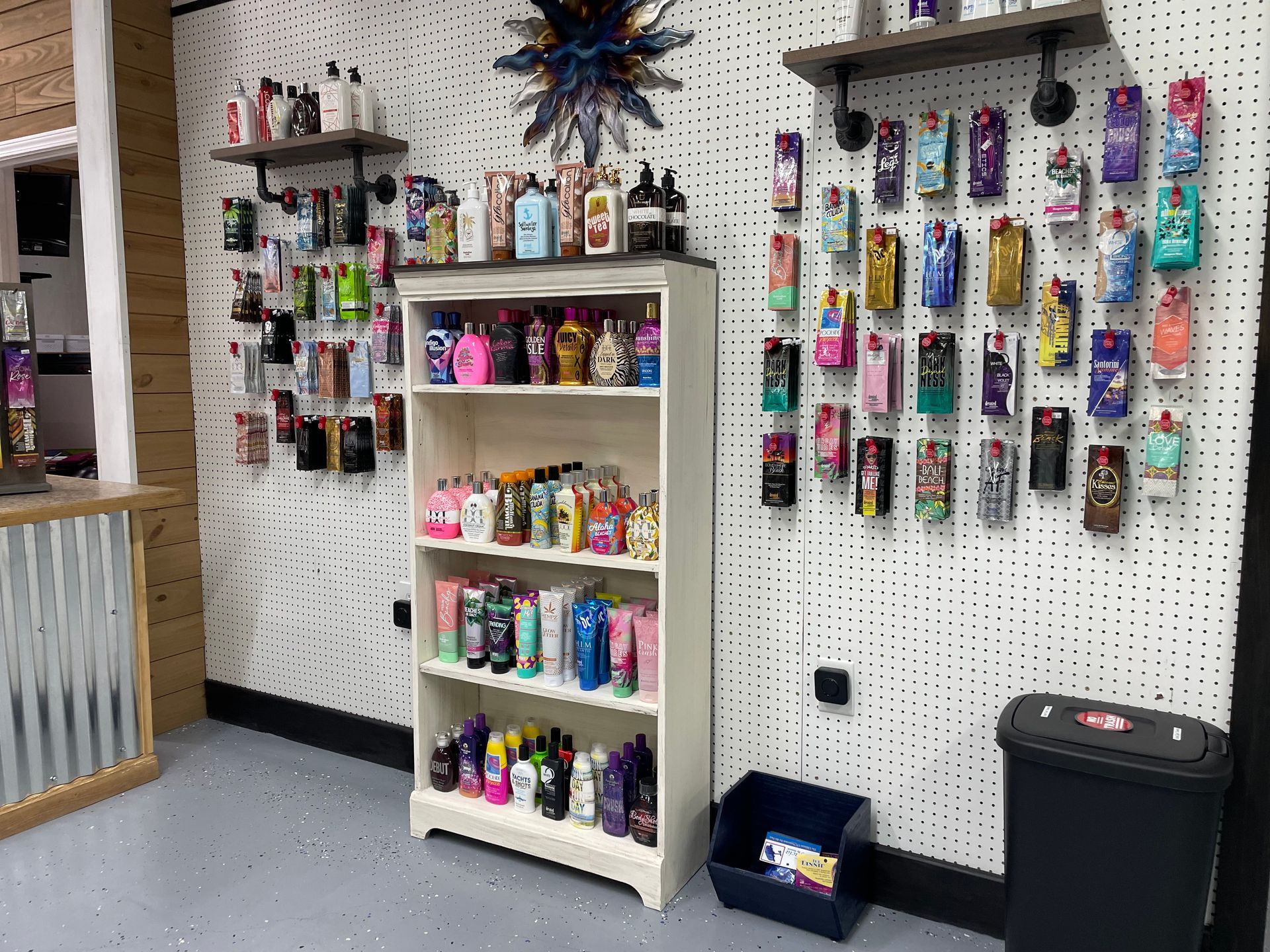 A room filled with shelves filled with lots of different types of cosmetics.
