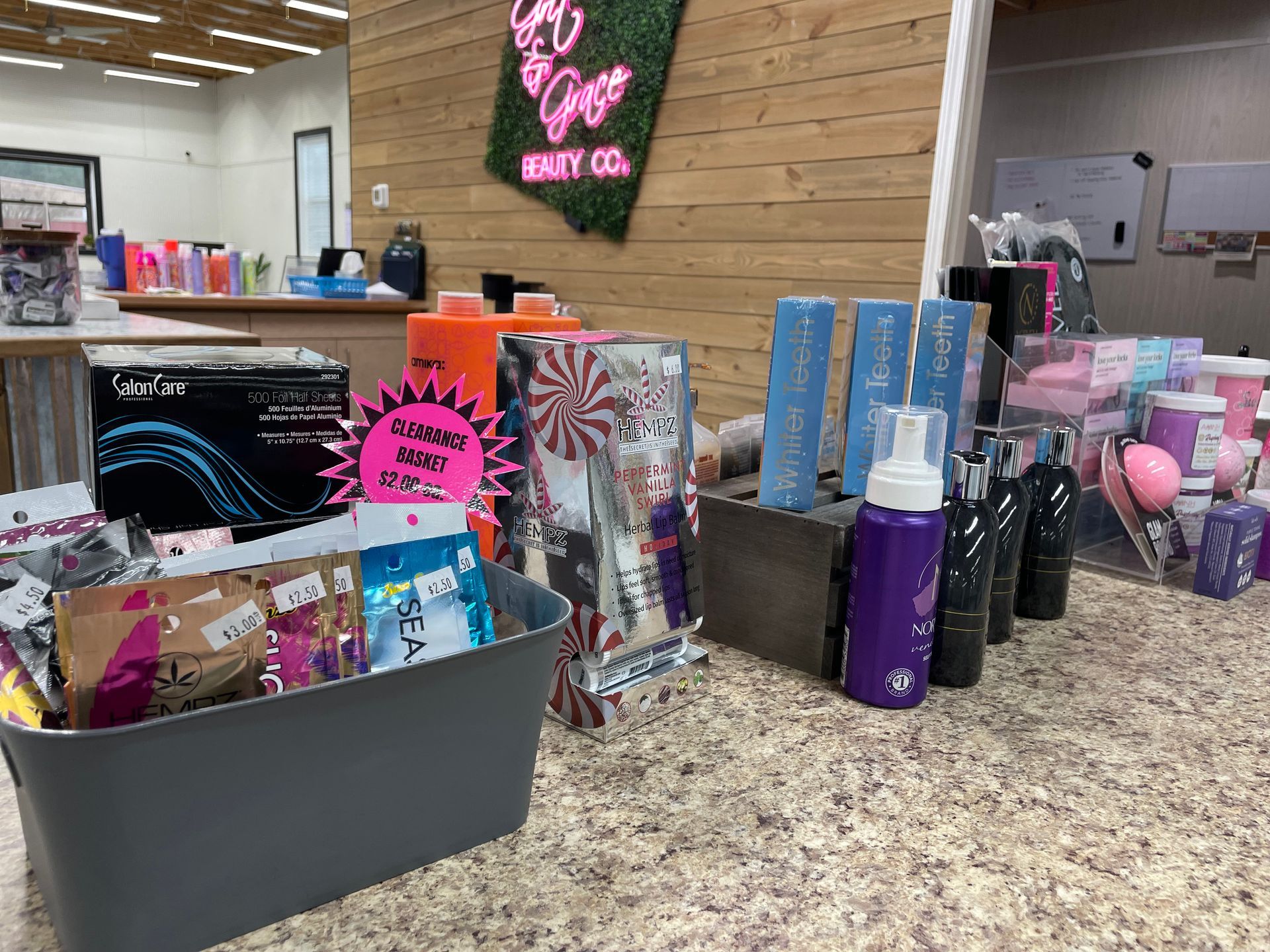 A counter top filled with a variety of beauty products.