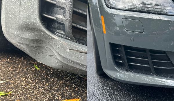 Damaged gray car bumper dented on the left, repaired on the right.