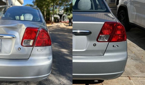 Silver car rear end with dent repaired. Sunlight on the car.