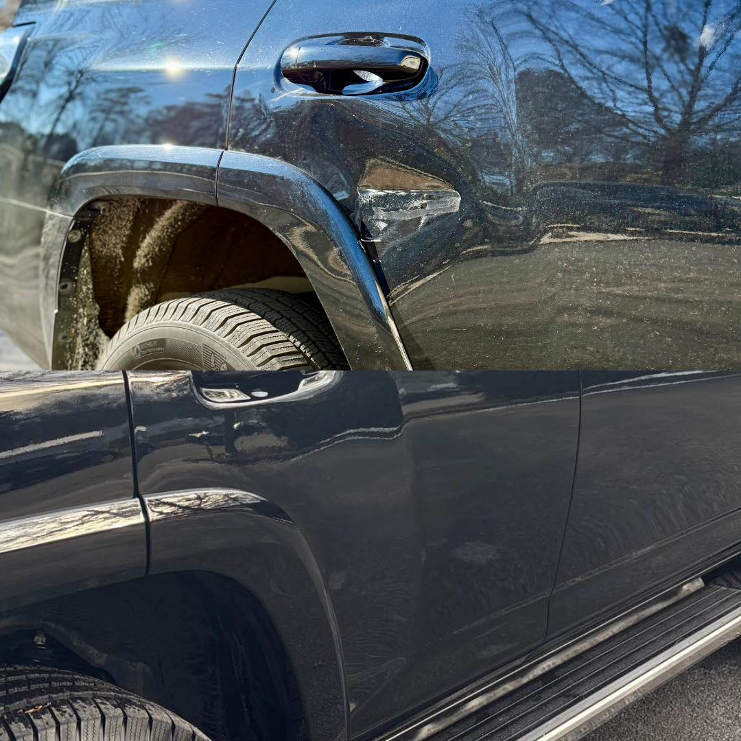 Black SUV, side view close-up showing a wheel, fender, and door. Sunny day.