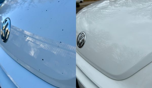 Before and after view of a white car hood; before has spots, after is clean and shiny.