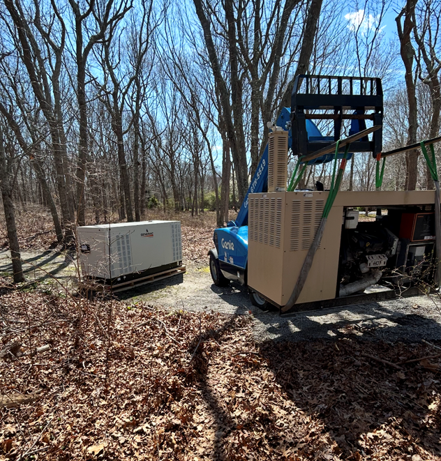 A blue forklift is parked in the middle of a forest