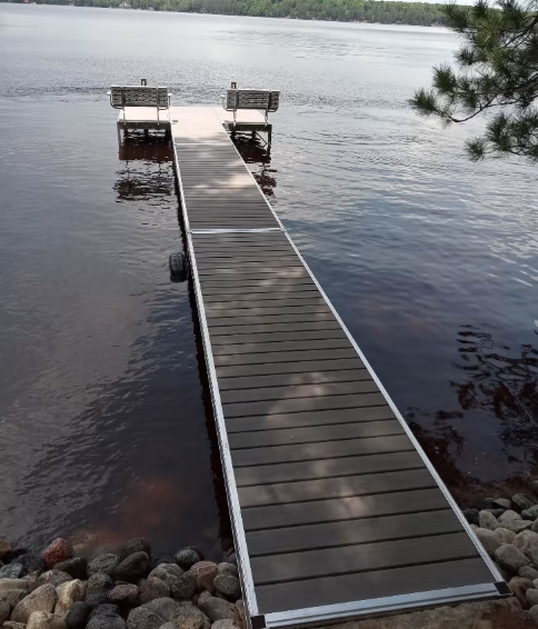 A wooden dock leading into a body of water