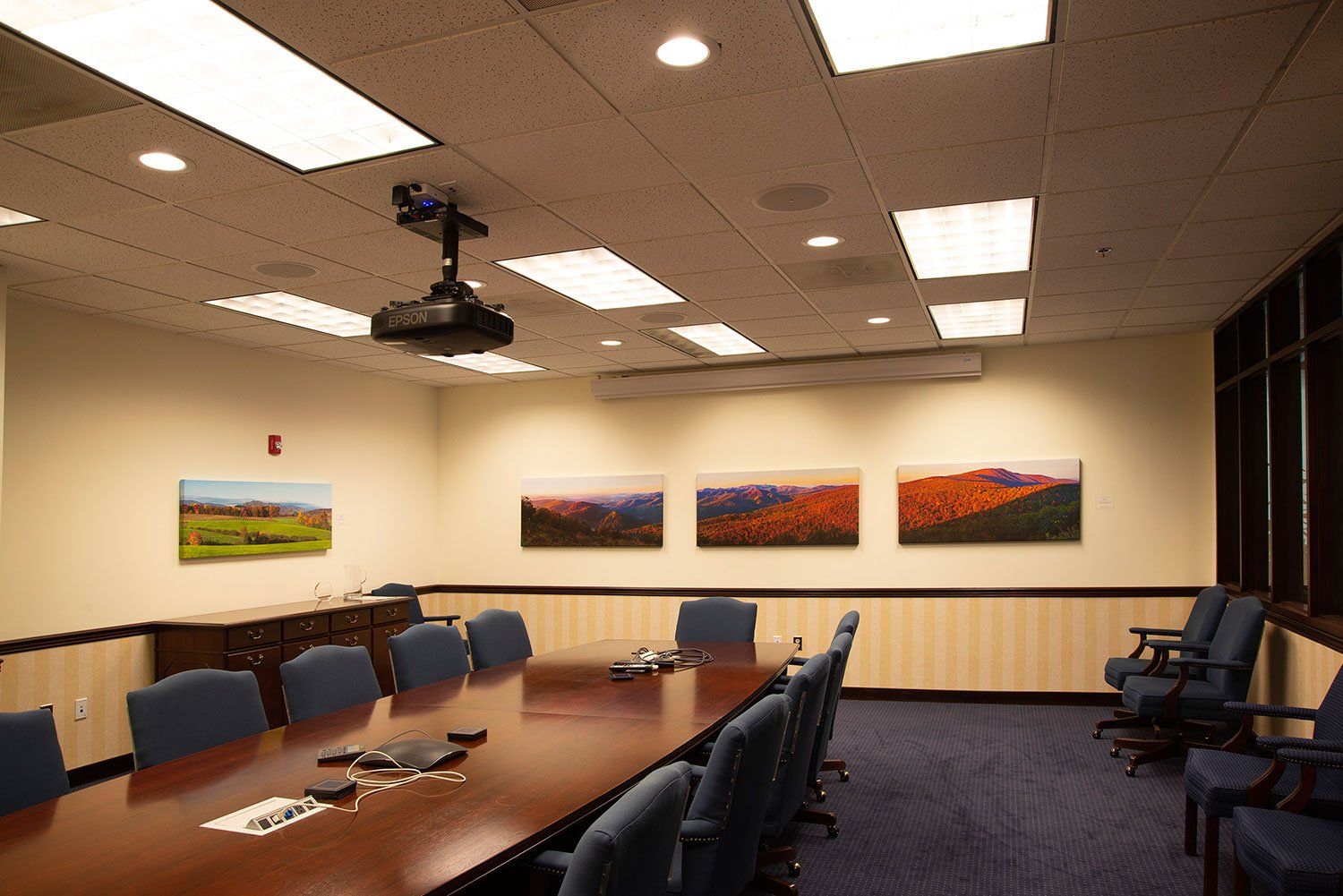framed photos inside an office