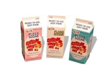 Three boxes of cotton candy mix are sitting next to each other on a table.