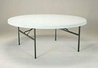 A white folding table with metal legs is sitting on a white surface.