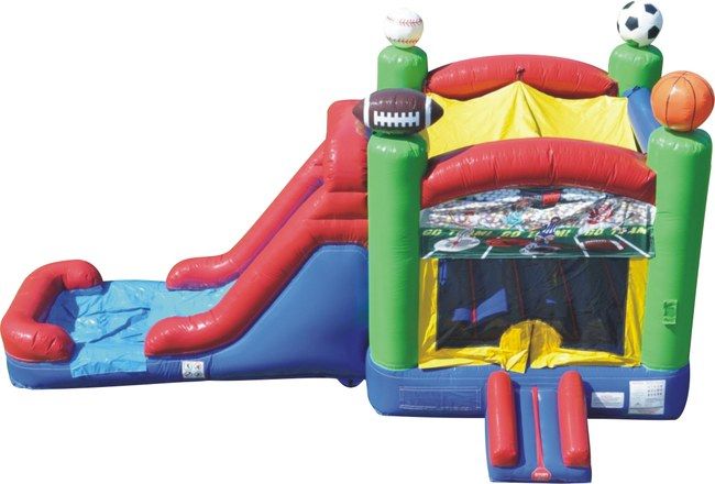 A bouncy house with a slide and a football on top