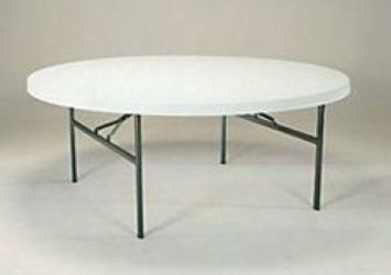 A white round table with black legs is sitting on a white surface.