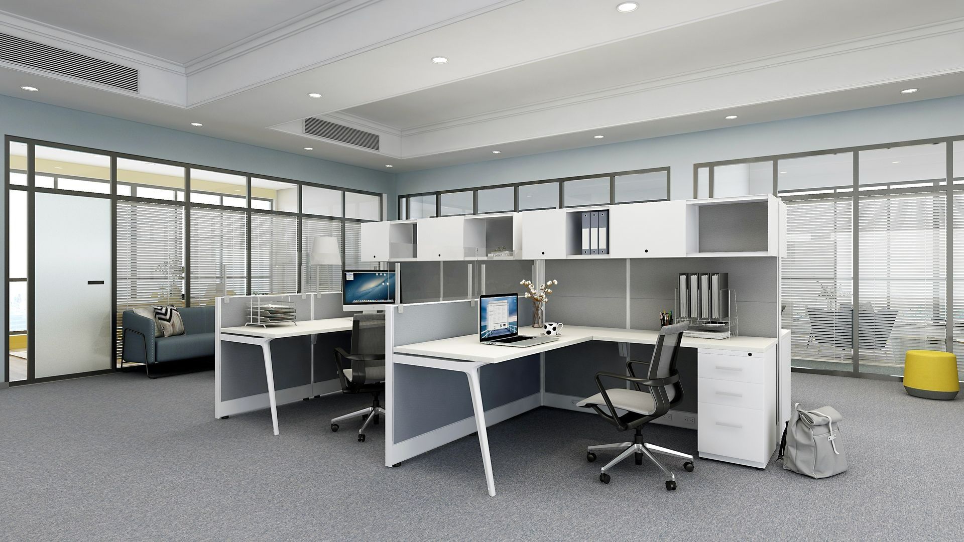 Modern office with desks, computers, chairs, filing cabinets, and large windows with blinds.