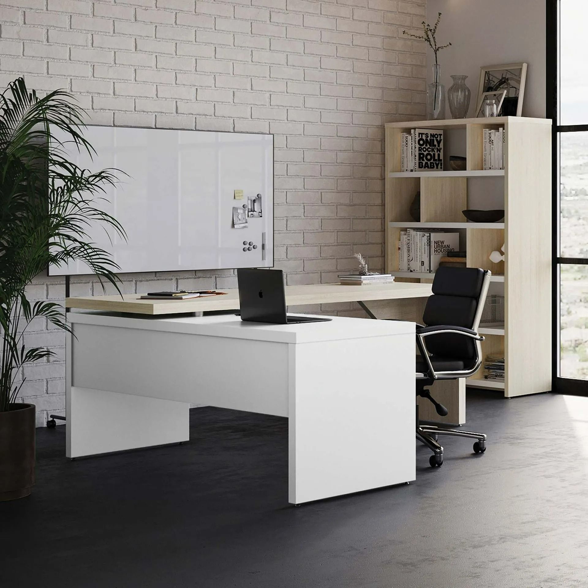 Modern office with white desk, black chair, laptop, whiteboard, and shelving against brick walls
