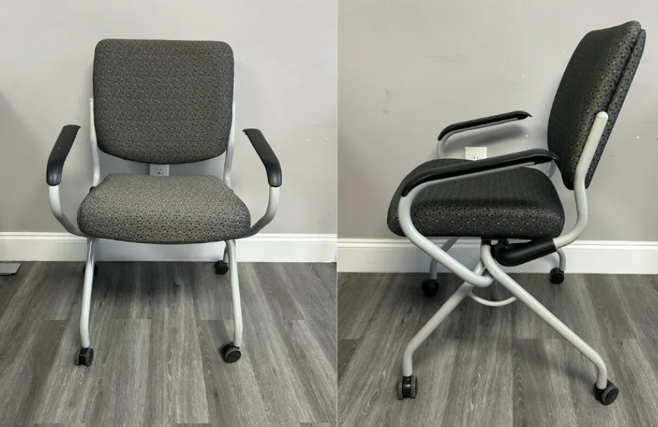 Gray upholstered office chair with armrests and chrome base, shown front and side views on a wood floor