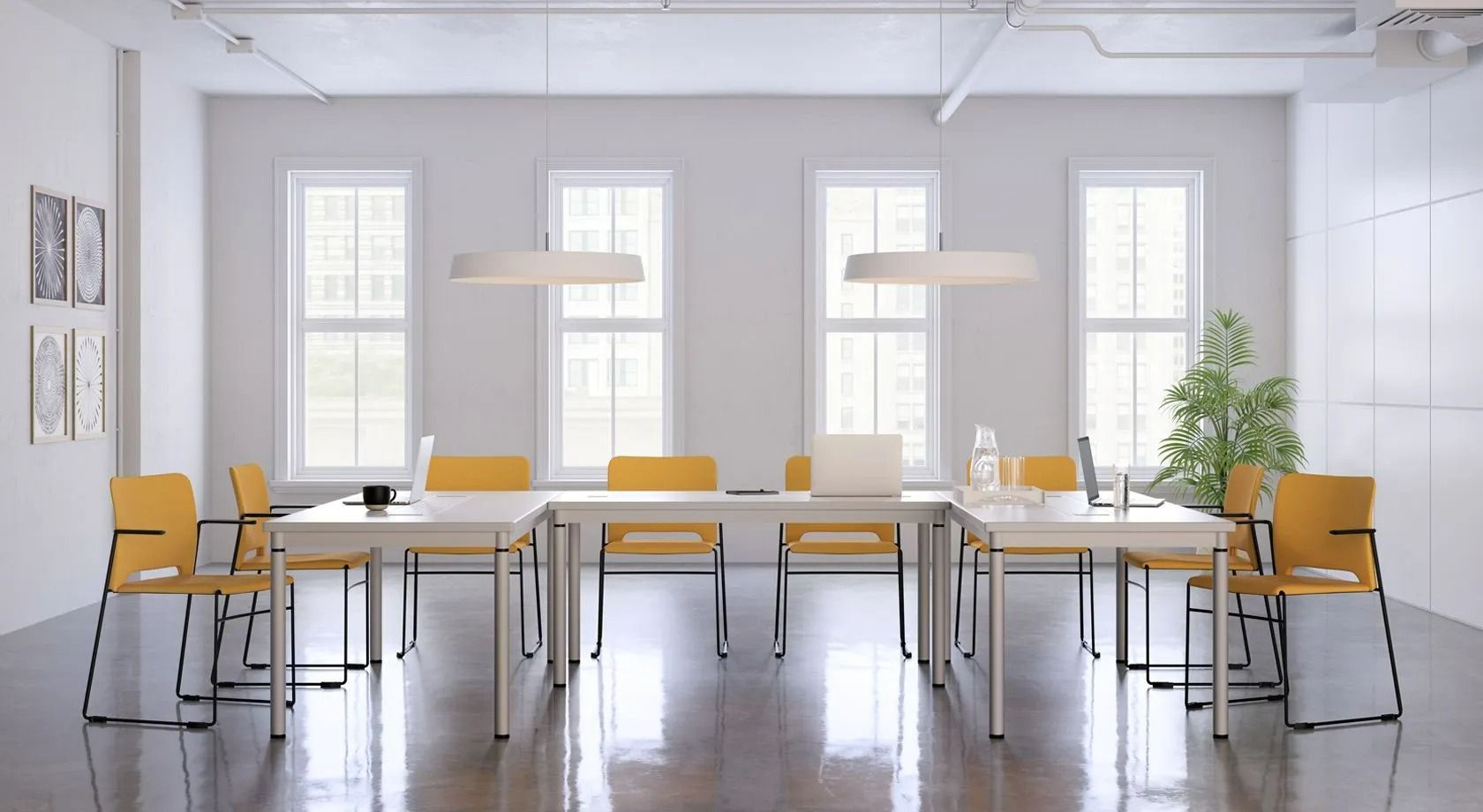 Bright modern conference room with a long table, yellow chairs, hanging lamps, and tall windows.