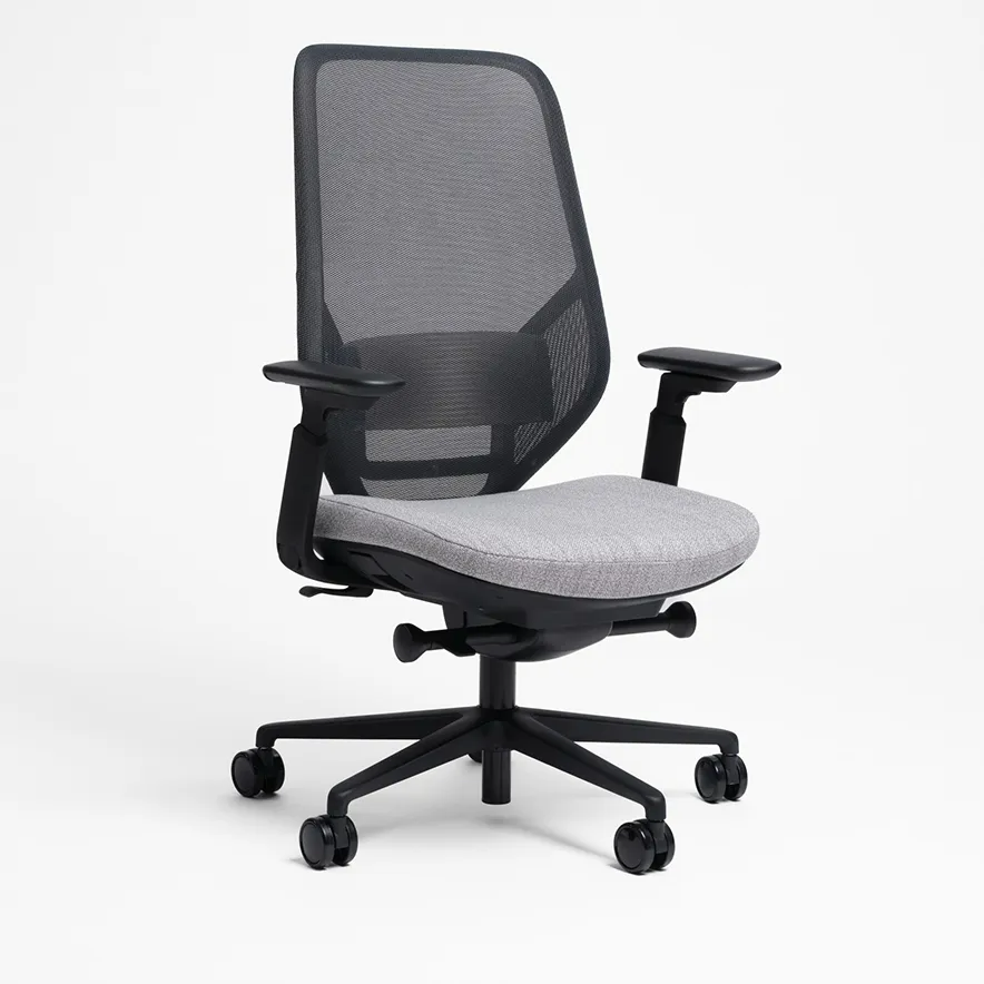 Gray mesh office chair with black frame, armrests, and five-wheel base on a white background