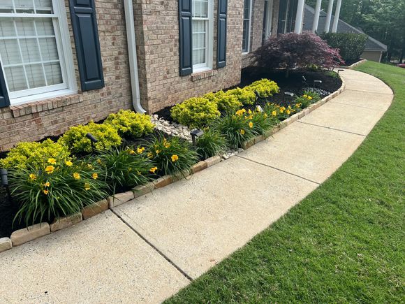 Landscaping with new flower bed