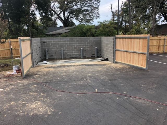 Solid wooden privacy fence in a residential area